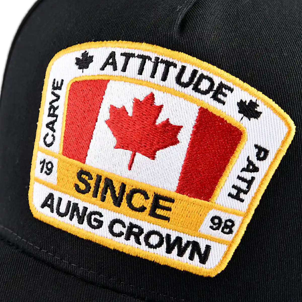 the flat embroidery applique on the front of the black 5 panel baseball hat KN2012251