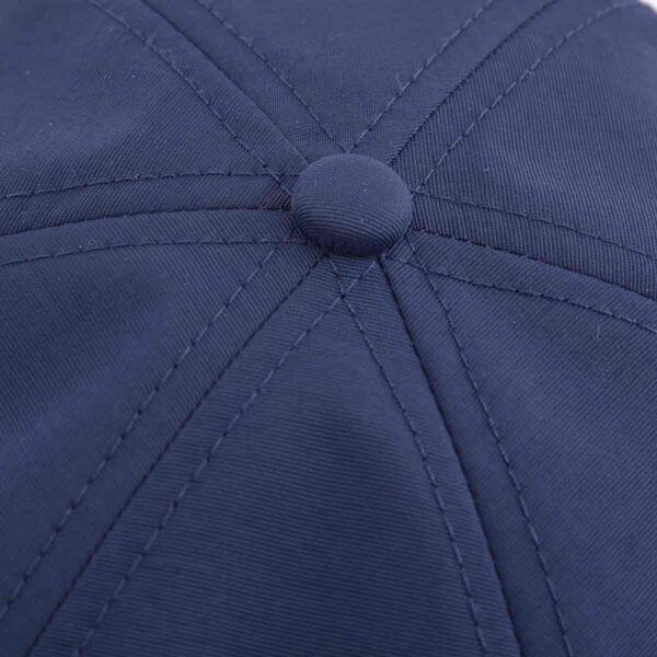 The top button of dark blue nylon baseball cap dad cap KN2102271