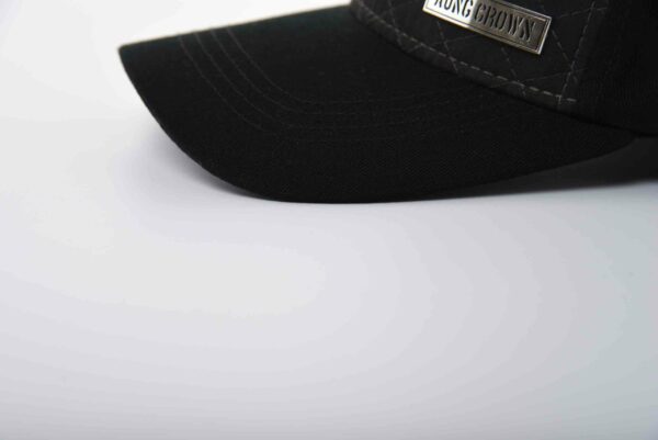 the curved brim of the metal baseball cap SFG-210429-6