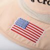 Aung Crown khaki bucket hat safari with the US flag applique on the brim KN2101284