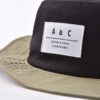 Aung Crown outdoor bucket hat with a woven label on the front KN2012211