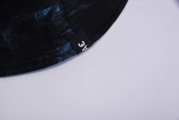 foldable woven label on the brim of the knit bucket hat SFG-210512-1