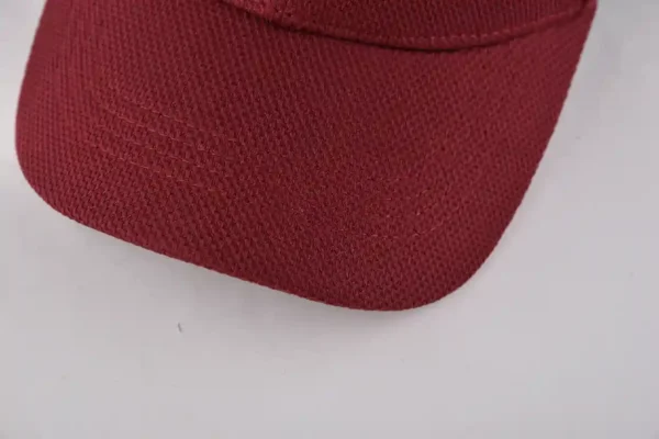 the curved brim of the adjustable baseball cap KN2012082