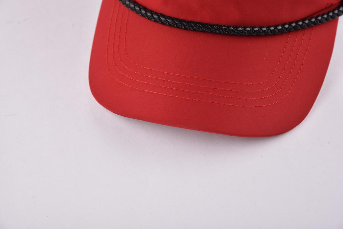 the curved brim of the red unisex baseball cap KN2012112 the curved brim of the red unisex baseball cap KN2012112