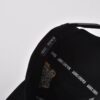 the inner label of the men's black baseball cap KN2012151