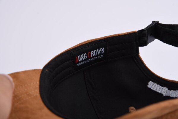 the inner sweatband on the brown suede baseball cap KN2102021