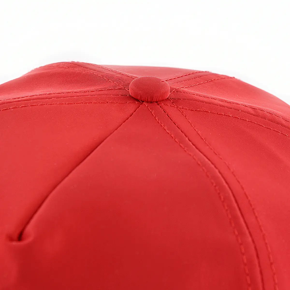the top crown of the red unisex baseball cap KN2012112