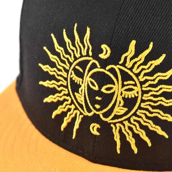 Aung Crown black and orange snapback hat with a flat embroidery logo on the front ACNA2011129