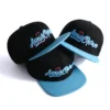 Aung Crown blue black snapback cap with a blue flat brim SFG-220402-1