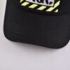 Aung Crown fashion black and yellow trucker hat with a black curved brim KN2012091