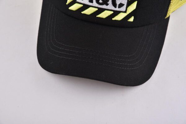 Aung Crown fashion black and yellow trucker hat with a black curved brim KN2012091