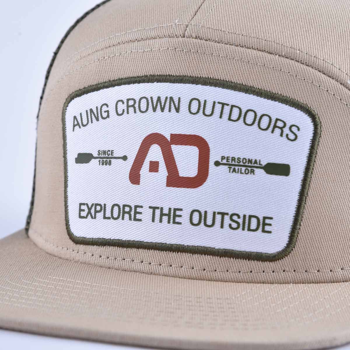 Aung Crown men's 7 panel trucker hat with a flat embroidery patch on the front ACNA2011124 Aung Crown men's 7 panel trucker hat with a flat embroidery patch on the front ACNA2011124