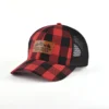 Aung Crown plaid red and black trucker hat with an embossed leather label KN2012072