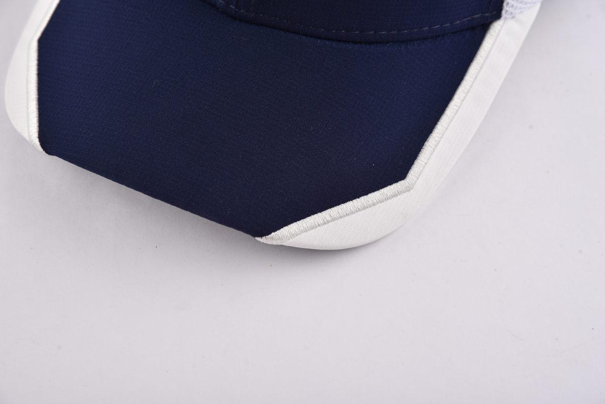 Aung Crown white and blue trucket hat with a patchwork curved brim KN2012121 Aung Crown white and blue trucket hat with a patchwork curved brim KN2012121