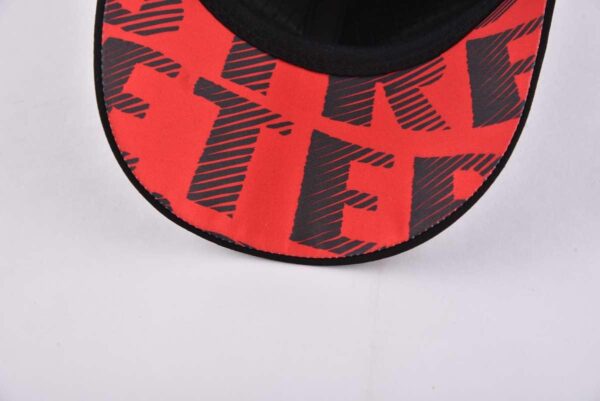 Streeter black curved brim trucker hat with a red lower brim KN2012141