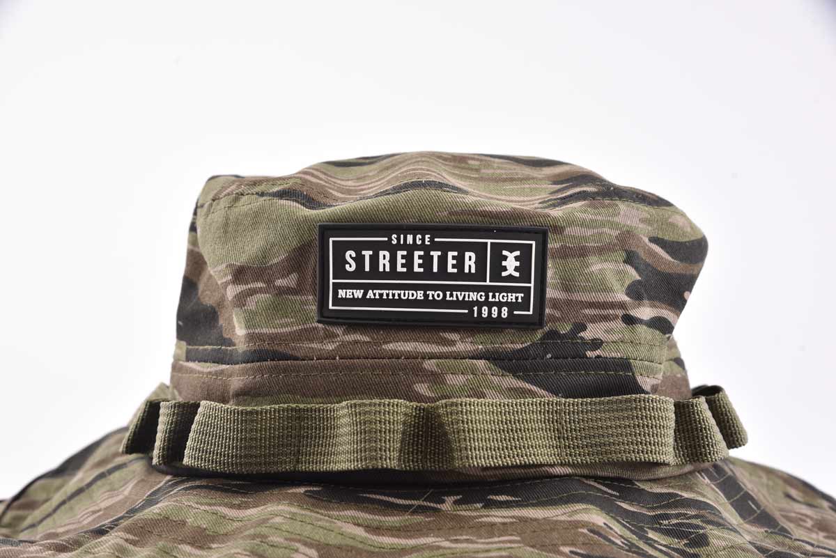 Streeter camo army bucket hat with a silicone patch at the front and a wide decorative strap KN2102024