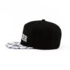 Streeter unisex black and white snapback hats at the horizontal view KN2102012