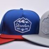 Streeter unisex trendy trucker hat with a 3D embroidery and flat mebroidery logo on the front KN2103125