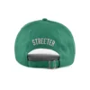 the tri-glide slide buckle on the back of the green baseball cap KN2012242